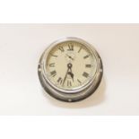 A Smiths ships clock, in a polished chrome case, the dial with Roman numerals and subsidiary