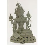 A Nepalese bronze bodhisattva, early 20th century, of Tara seated on lotus pedestal, her right