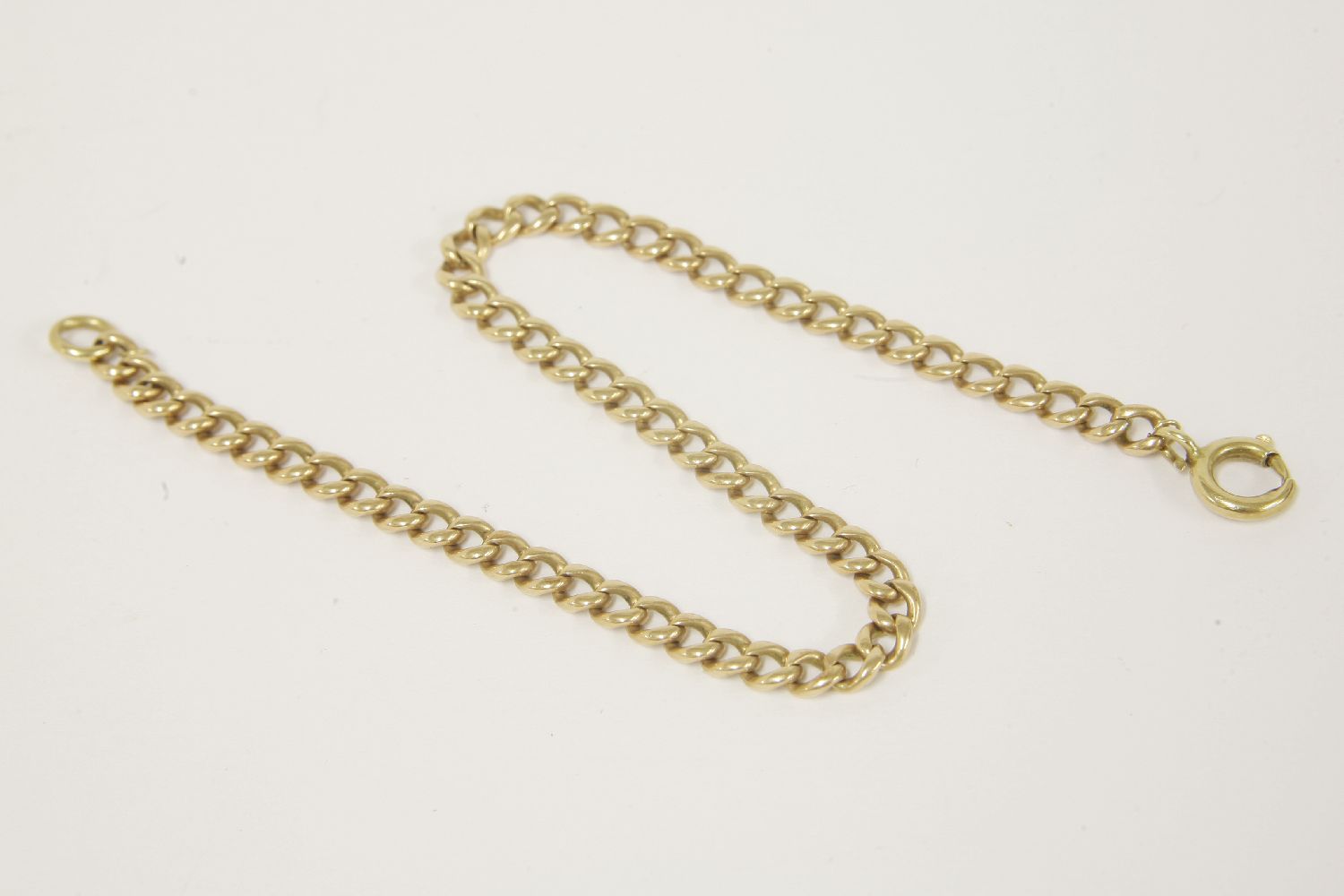 A gold filed curb link bracelet, (tested as approx 14ct gold) 7.51g