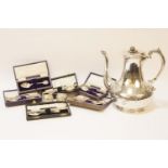 A collection of six silver presentation tennis teaspoons (all cased), a pair of silver napkin rings,