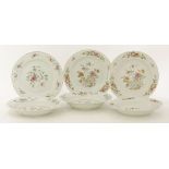 A collection of famille rose ceramics, 18th century, comprising a pair of soup bowls, painted with