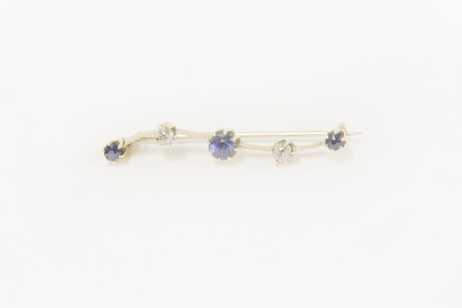 A gold sapphire and diamond five stone bar brooch, in case2.63g