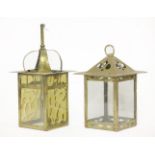 An Arts & Crafts brass hall lantern,with pierced details and clear glass panels,34cm high,