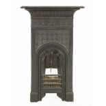 Two matching Victorian cast iron fireplaces,with roundels, a hatched panel and with Victorian
