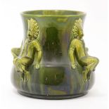 An Ault green and yellow mottled glaze jardinière, designed by Dr Christopher Dresser, the four