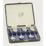 A set of six silver and enamelled spoons,designed by Archibald Knox for Liberty & Co., Birmingham,