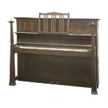 An Arts & Crafts oak upright piano,by Bechstein, with candle branches,150cm wide