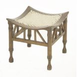 A 'Thebes' type stool, with a woven string seat, 37.5cm wide38.5cm deep38cm high