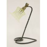 An Arts & Crafts wrought iron table lamp, designed by W A S Benson, with an opaline glass shade,