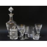 A collection of cut glasses, comprising two decanters, tumblers and pedestal glasses (qty)
