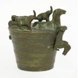 A set of nine bronze cup weights, the hinged lid with a horse and two elephants supporting the