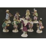 A Meissen monkey band,19th century, including drummer boy, bagpipe player, French horn, trumpet,