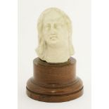 A fragment alabaster head of the Virgin,17th century, probably Italian, later mounted on a wood