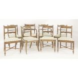 A set of six George III mahogany bar back dining chairs, with drop-in seats, turned front legs and