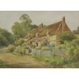 *Henry John Sylvester Stannard (1870-1951)A COTTAGE GARDENSigned l.l., watercolour26 x 35cm;and