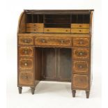 An Edwardian strung mahogany cylinder bureau,the fitted interior with a leathered pull-out writing
