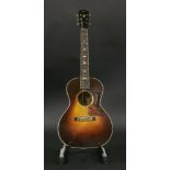 A 1935 Gibson ‘Nick Lucas Special’ acoustic guitar,serial no. 92126 and the FON number appears to be