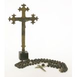 A crucifix and rosary beads,the cross inset with wood, fixed to the link rosary beads,crucifix