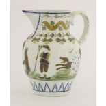 A Prattware pottery jug, early 19th century, moulded with an amusing scene of the Grey Goose nursery