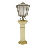 A painted metal and glazed lantern,mounted on a painted 'grained' column,lantern 70cm highoverall