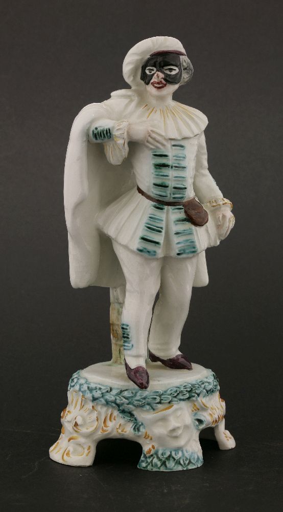 A Cozzi Italian masked figure of Pierrot,19th century, mounted on circular base, applied with