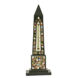 A Victorian Ashford marble obelisk desk thermometer, the front inlaid with polished hardstones, with