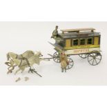 A rare German tin toy omnibus, 19th century, painted with destinations, 'Kew Gardens, Sloane St.,