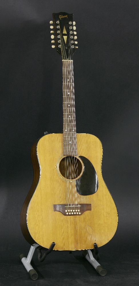 An early 1970s Gibson JG12 acoustic guitar,serial no. 674650, the dreadnought-shaped body in a