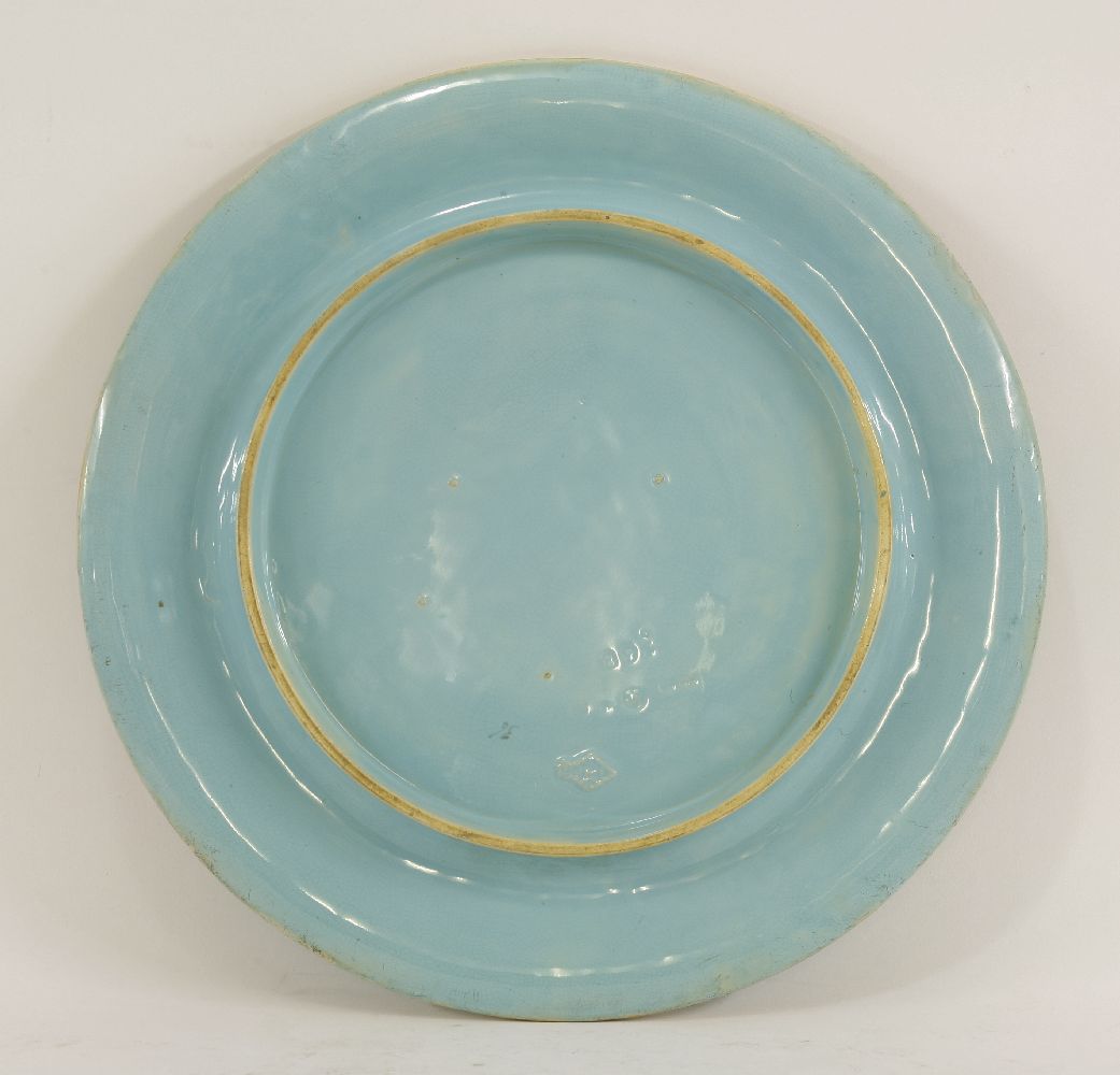 A Minton majolica bread plate, dated 1877, with a moulded border with wheat and barley ears and ' - Image 2 of 2