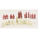 A Canton carved ivory chess set,19th century, natural and stained red, with well carved figures