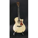 A 2004 Taylor 414 - CE - L5 UK Ltd Edition acoustic guitar,serial number 20040519056, in a natural