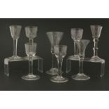 Eight wine glasses,18th century and later, including bell bowl on folded foot, double knopped