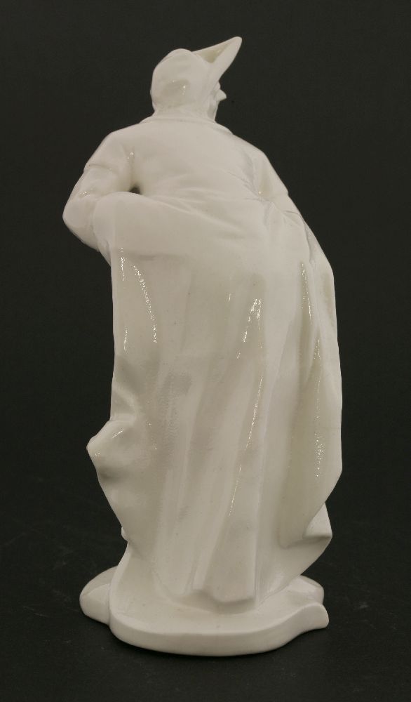 A Komodie white porcelain figure,of Pantalone leaning forward on a shaped circular base, with - Image 2 of 3