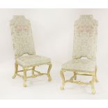 A pair of George I-style high back single chairs,on carved giltwood legs and stretchers,123cm