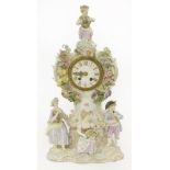 A Meissen porcelain figural mantel clock,c.1870, 'The Four Seasons', the dial with gilt Roman