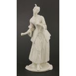 A Komodie white porcelain figure,‘Isabella’, mounted on shaped oval base, with impressed mark and