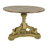 An hall table,19th century, the circular reconstituted marble top of dished form over a gilt