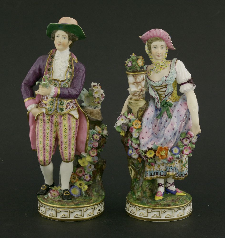 A pair of Minton figures,of a gardener and his female companion, the young man dressed in