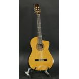 A 1993 Takamine CP-132SC classical guitar,serial number 93101161, with bottom cutaway in a natural