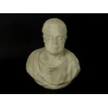 An antique carved marble bust,of a bearded man, 28cm high