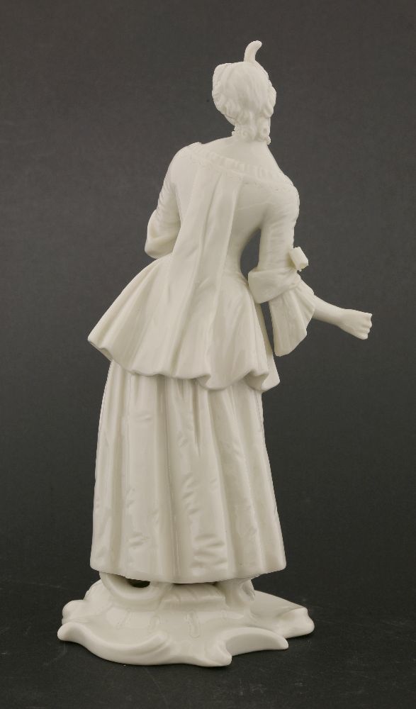 A Komodie white porcelain figure,‘Isabella’, mounted on shaped oval base, with impressed mark and - Image 2 of 3