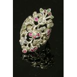 A diamond, ruby, emerald, sapphire and marcasite giardinetti ring,with a rose cut diamond and ruby