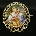 A Victorian Berlin painted porcelain plaque brooch,depicting two young ladies in 18th century