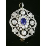 A late Victorian sapphire and diamond lobed cluster brooch/pendant, c.1890,an oval mixed cut