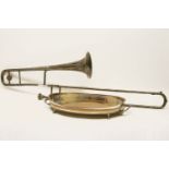 A silvered trombone, together with a Regency silver oval galleried tray, 52cm wide