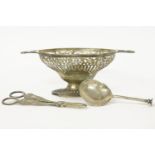 A hallmarked silver sweetmeat dish of navette form, with pierced decoration, together with a