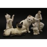 A collection of Beswick and other porcelain animal figures, together with two Royal Doulton