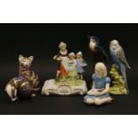 Six items of china, Royal Crown Derby Badger and Cat, Royal Doulton child 'Alice', Beswick Budgy,