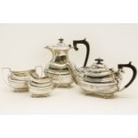 A four piece silver tea service, the coffee pot Fordham & Fordham, Sheffield 1918 and 1920,height