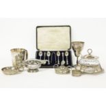 A cased set of six coffee spoons, a preserve pot and cover, and other silver plated items